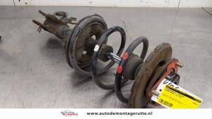 O183858 Gebruikte veerpoot links-voor Nissan Murano