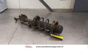 O183885 Gebruikte schokdemperpoot links-voor Nissan Pixo