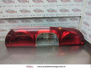 O183991 Gebruikte achterlicht links Fiat Doblo