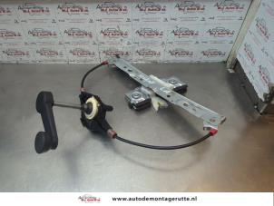 O184002 Gebruikte raammechaniek 4deurs links-achter Ford Fiesta