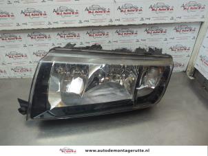 O184042 Gebruikte linker koplamp Skoda Fabia