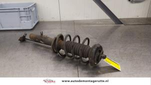O184048 Gebruikte schokdemperpoot links-voor Peugeot 207