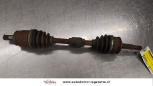 O184231 Gebruikte aandrijfas links-voor Nissan Micra