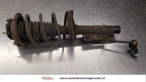 O184346 Gebruikte schokdemperpoot links-voor Ford Focus
