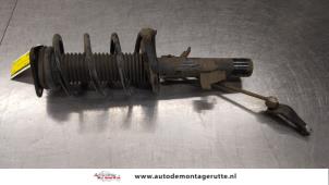O184366 Gebruikte schokdemperpoot links-voor Ford Focus