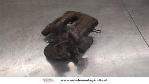 O184469 Gebruikte reactiestang links-achter Mazda 3.