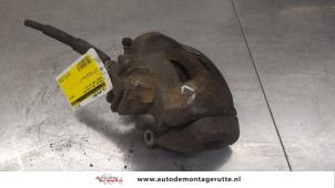 O184471 Gebruikte remklauw (tang) links-voor Peugeot 3008
