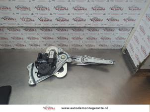 O184501 Gebruikte ruitmechaniek 4deurs links-achter Renault Grand Scenic