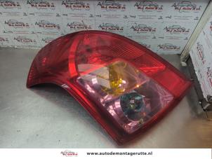 O184552 Gebruikte achterlicht links Suzuki Swift