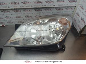 O184553 Gebruikte koplamp links Opel Astra