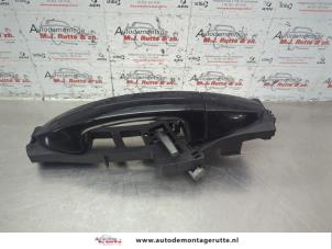 O184561 Gebruikte deurgreep 4deurs links-achter Ford Fiesta