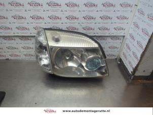 O184609 Gebruikte rechter koplamp Nissan X-Trail