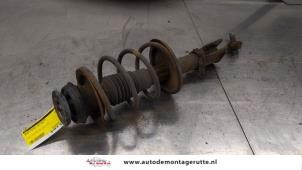 O184655 Gebruikte schokdemperpoot rechts-voor Renault Twingo