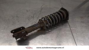 O184657 Gebruikte voorpoot links Opel Agila