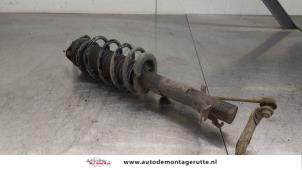 O184660 Gebruikte voorpoot links Mazda 2.