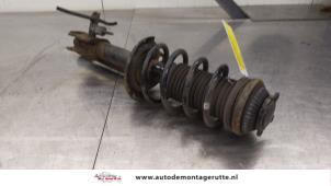 O184662 Gebruikte schokdemperpoot links-voor Opel Zafira
