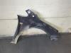 Gebruikte Spatbord links-voor Opel Astra O184670
