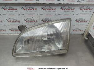 O184740 Gebruikte linker koplamp Toyota Starlet