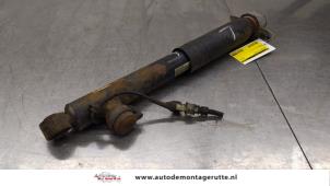 O184935 Gebruikte schokdemper links-achter Opel Astra