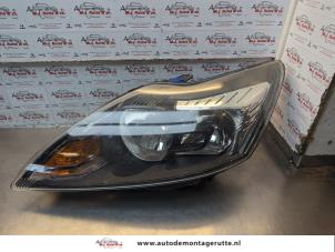 O185043 Gebruikte koplamp links Ford Focus