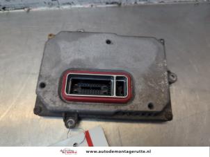 O185047 Gebruikte xenon module Audi A4