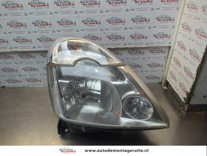 O185067 Gebruikte rechter koplamp Renault Modus