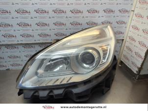 O185075 Gebruikte linker koplamp Renault Megane Scenic