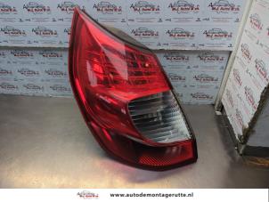O185077 Gebruikte achterlicht links Renault Megane Scenic