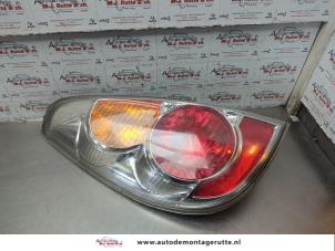 O185171 Gebruikte achterlicht links Suzuki Liana