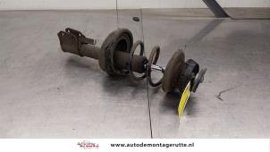 O185434 Gebruikte schokdemperpoot rechts-voor Renault Twingo