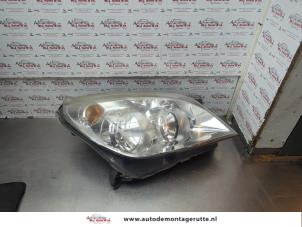 O185596 Gebruikte rechter koplamp Opel Astra