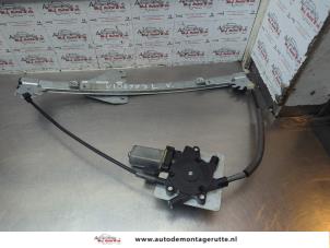 O185601 Gebruikte ruitmechaniek 2deurs links-voor Volkswagen Fox