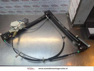 O185614 Gebruikte raammechaniek 2deurs links-voor Mini ONE