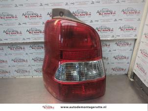 O185718 Gebruikte achterlicht links Mazda Demio