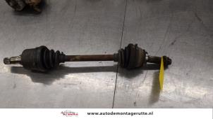 O185907 Gebruikte steekas links-voor Ford Escort