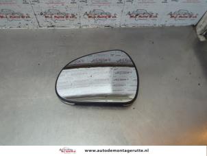 O186016 Gebruikte spiegelglas links Peugeot 207