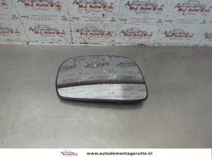 O186019 Gebruikte spiegelglas links Opel Agila