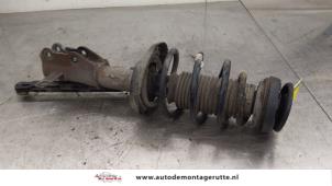 O186035 Gebruikte schokdemperpoot rechts-voor Opel Insignia