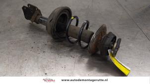 O186043 Gebruikte veerpoot links-voor Renault Twingo