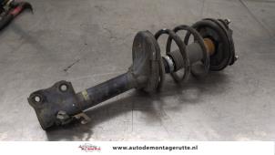 O186048 Gebruikte schokdemperpoot rechts-voor Mitsubishi Outlander