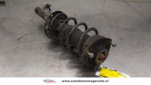 O186051 Gebruikte mac phersonpoot links-voor Volkswagen Golf