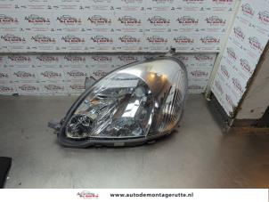 O186072 Gebruikte linker koplamp Toyota Yaris