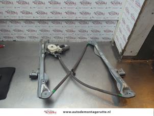 O186084 Gebruikte ruitmechaniek 4deurs links-voor Ford Focus
