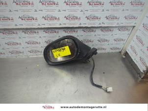 O186118 Gebruikte buitenspiegel links Mitsubishi Carisma