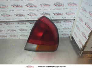 O186123 Gebruikte achterlicht rechts Mitsubishi Carisma