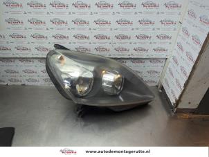 O186133 Gebruikte rechter koplamp Opel Zafira