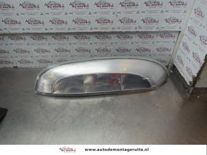 O186219 Gebruikte achterlicht links Opel Corsa
