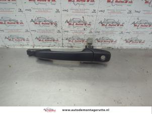 O186271 Gebruikte portiergreep 4deurs links-voor Mazda 2.