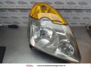 O186421 Gebruikte rechter koplamp Renault Modus