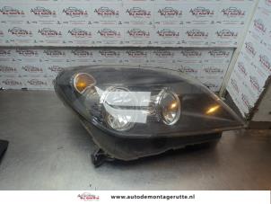 O186532 Gebruikte rechter koplamp Opel Astra